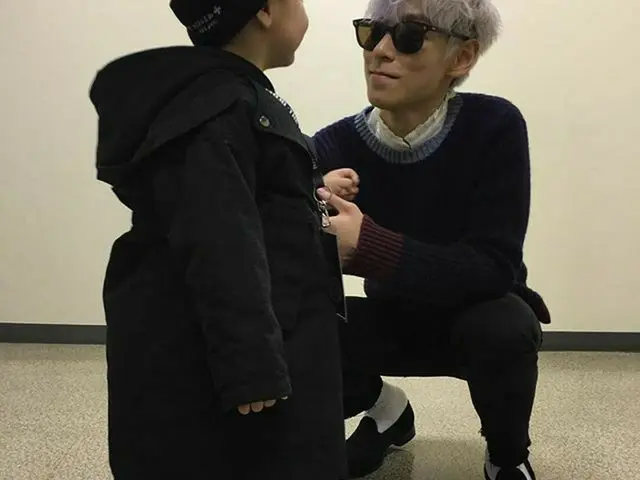 TOP (BIGBANG), uncle's smile.