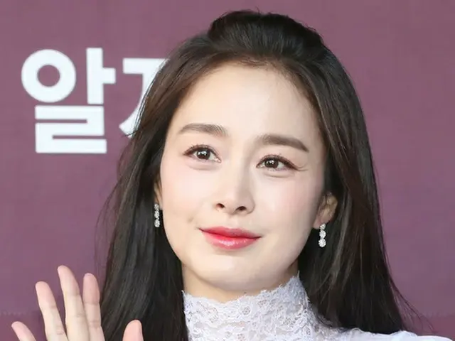 Actress Kim Tae Hee attends the collection launch event. . .